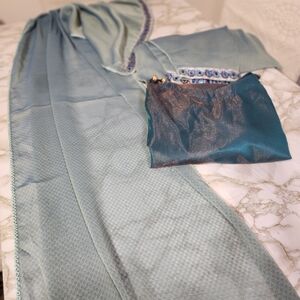 Elegant Blue and Teal Dress with Embellished Border